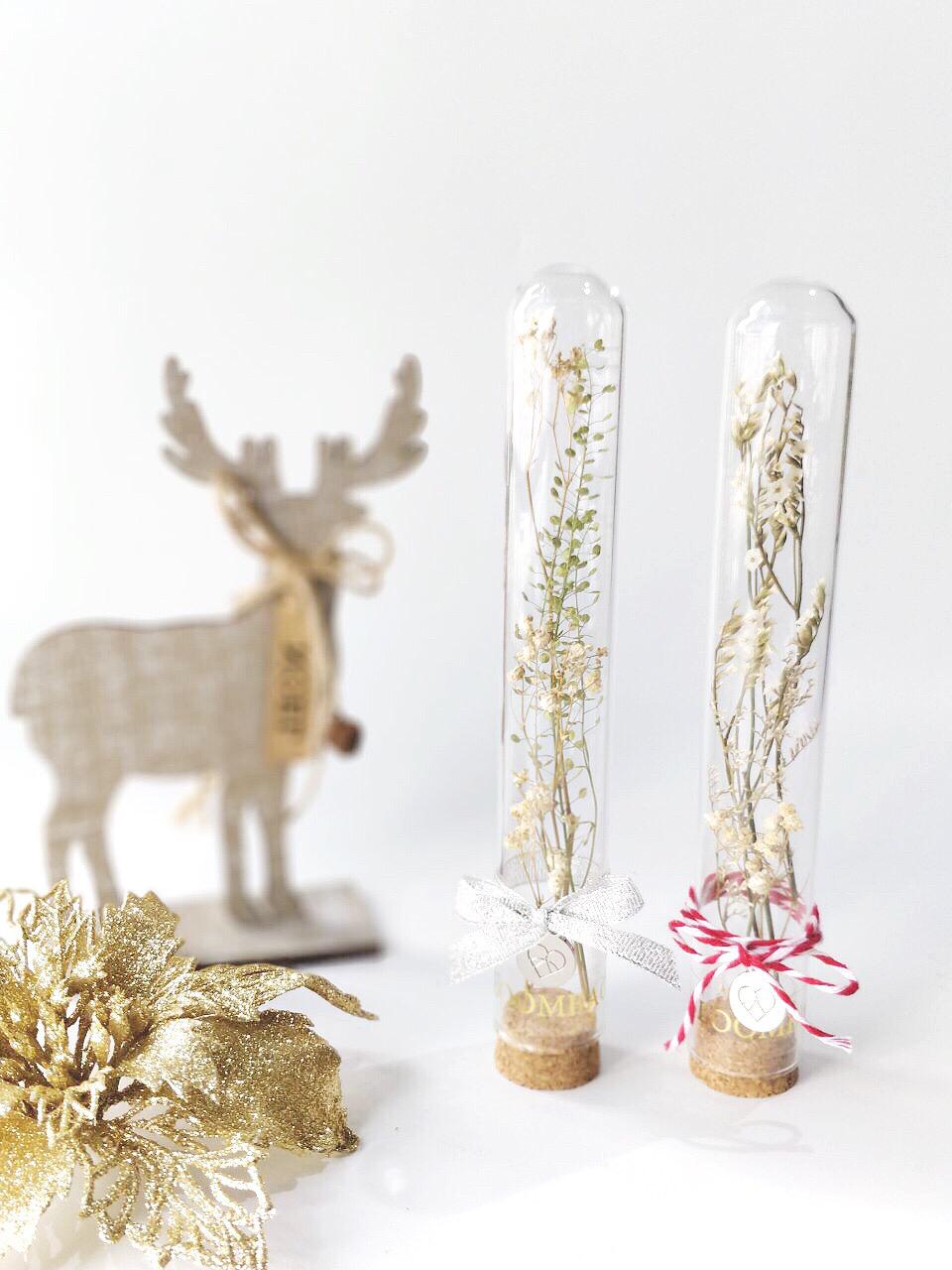 dried flowers in test tubes